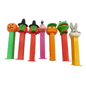 7 Vintage PEZ Dispensers Lot Halloween Muppets Garfield Bugs Bunny Dino Kermit